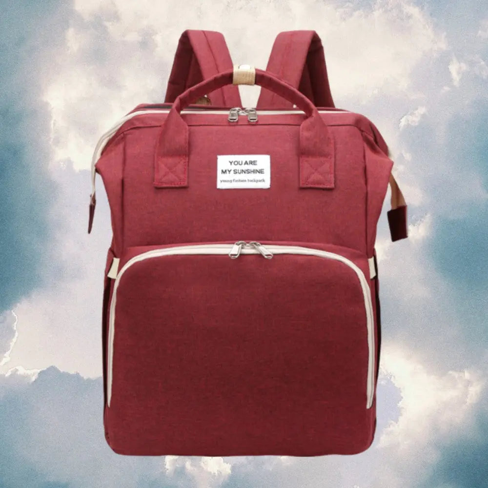 Baby-Reisebett-Rucksack in Rot  – Multifunktionaler Babyrucksack und Wickeltasche, ideal für unterwegs mit 16 Taschen, isolierten Flaschenfächern und Kinderwagenbefestigungen. - KnuddelKopf