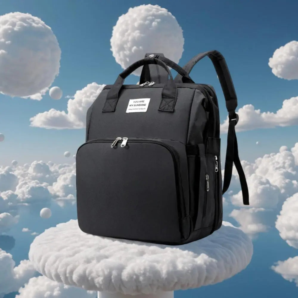 Baby-Reisebett-Rucksack in Schwarz – Multifunktionaler Babyrucksack und Wickeltasche, ideal für unterwegs mit 16 Taschen, isolierten Flaschenfächern und Kinderwagenbefestigungen. - KnuddelKopf